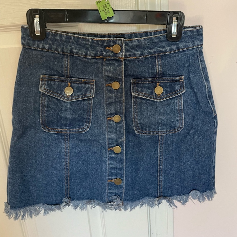 Front buttoned denim mini skirt with good button detail